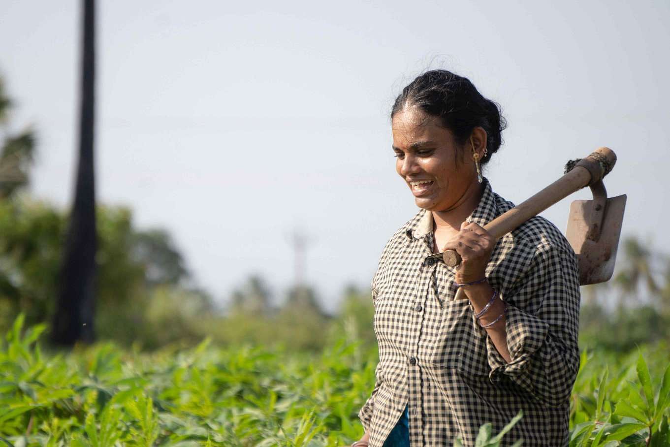 Village women with shovel in hand